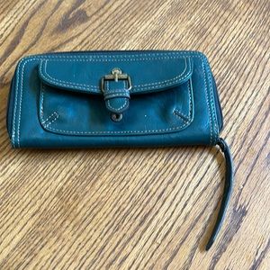 Axcess brand wallet with outside coin area and lots of room inside